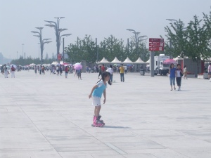 A young girl rollerblades on the Olympic Green in the summer of 2009. Photo by Shawna Xu.